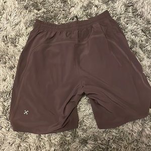 Lululemon size m 9inch linerless pace breaker in rare wine color, lightly used